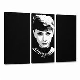 Ručne maľovaný POP Art obraz Audrey HEPBHURN – 3D vizualizácia ručne maľovaného plátna na bielom pozadí. Dominantné farby: čierna, biela, sivá.