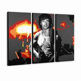 Ručne maľovaný POP Art obraz Rambo – 3D vizualizácia ručne maľovaného plátna na bielom pozadí. Dominantné farby: čierna, oranžová, biela, červená, sivá.