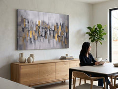Ručne maľovaný obraz na plátne s motívom panoráma mesta v bielo-sivých odtieňoch zavesený v interiéri kancelárie, pokojná atmosféra | Maľovaný obraz na stenu ABSTRAKT – interiér